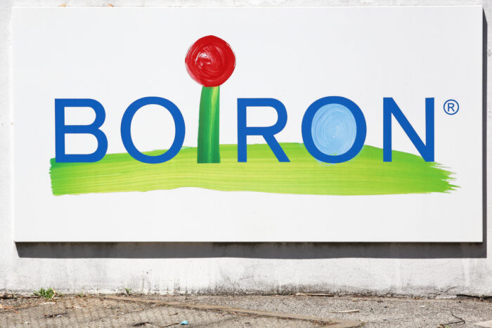 Boiron Laboratories logo on a wall.