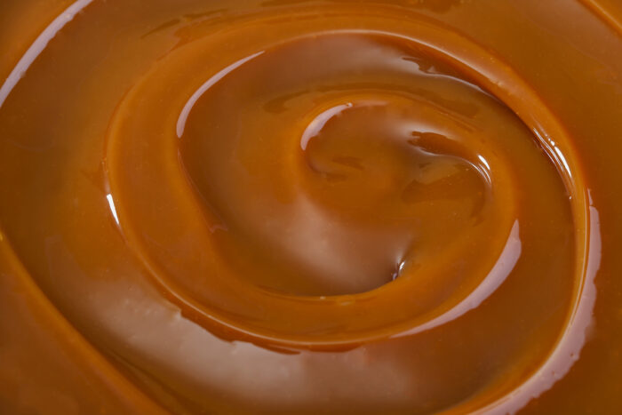 Close up of melted caramel, representing the Brach's class action lawsuit