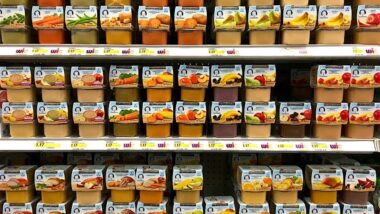 Grocery shelf with Gerber All Natural Second Stage Baby foods in peel top containers.