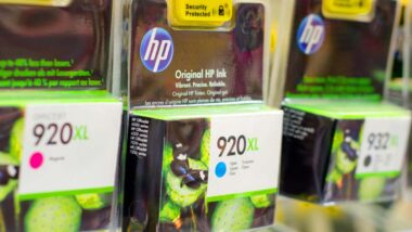 Close up of HP ink cartridges for sale in a store, representing the HP monopoly class action.