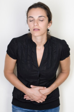 iStock-Mirena-IUD-Woman-Stomach-Pain