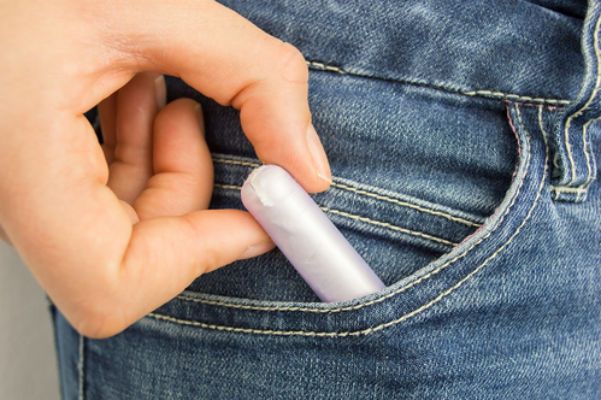 tampon inside jean pocket