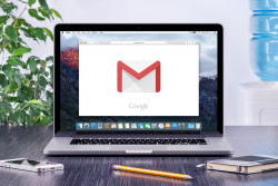 Google Gmail logo on the Apple MacBook Pro display that is on of