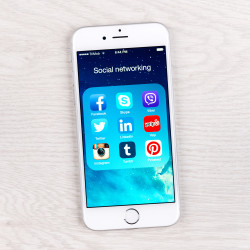 Social networking applications on an iPhone 6 display