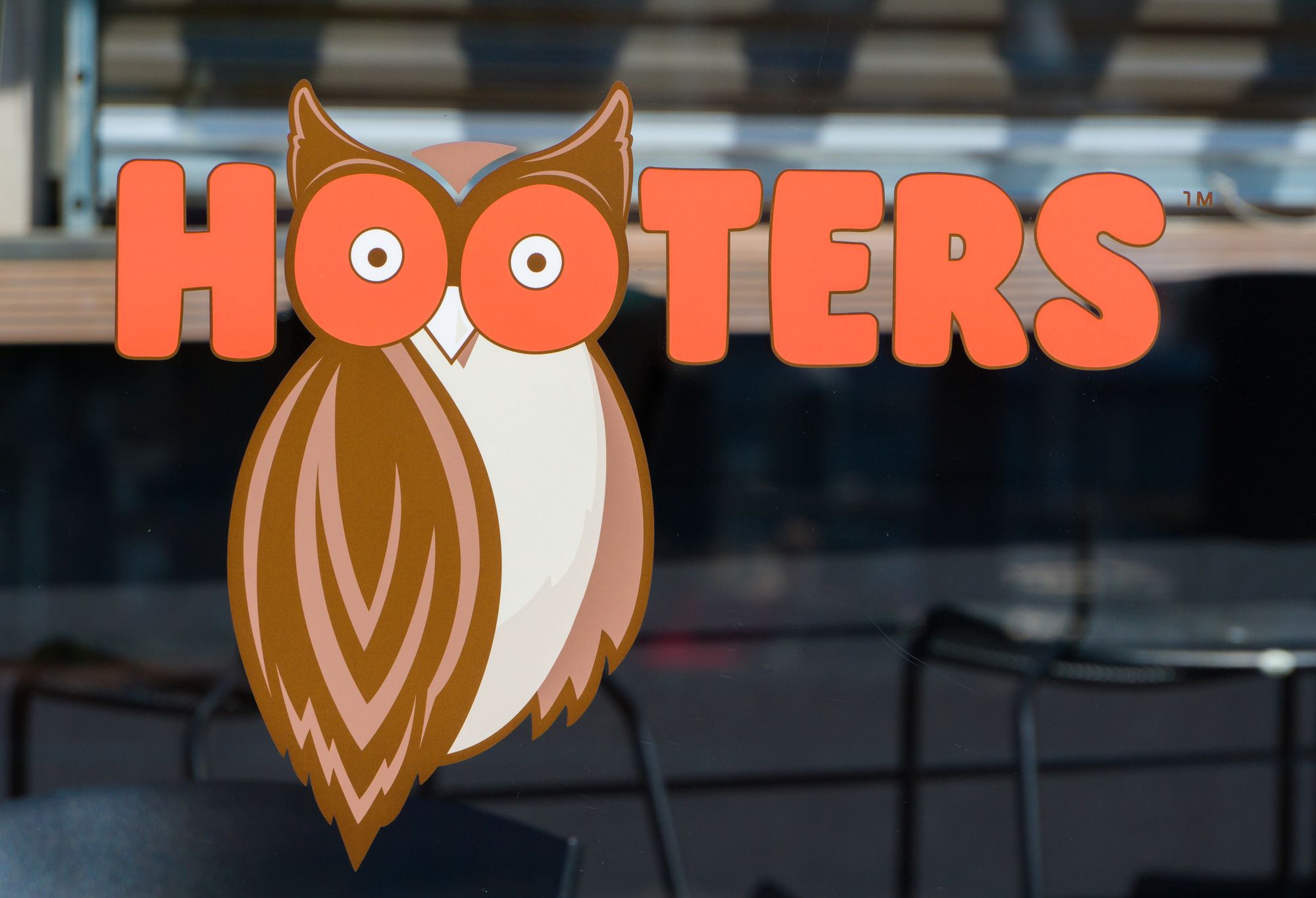 LONG BEACH, CA/USA - MARCH 19, 2016: Hooters exterior and logo. Hooters is a casual dining restaurant chain in the United States.