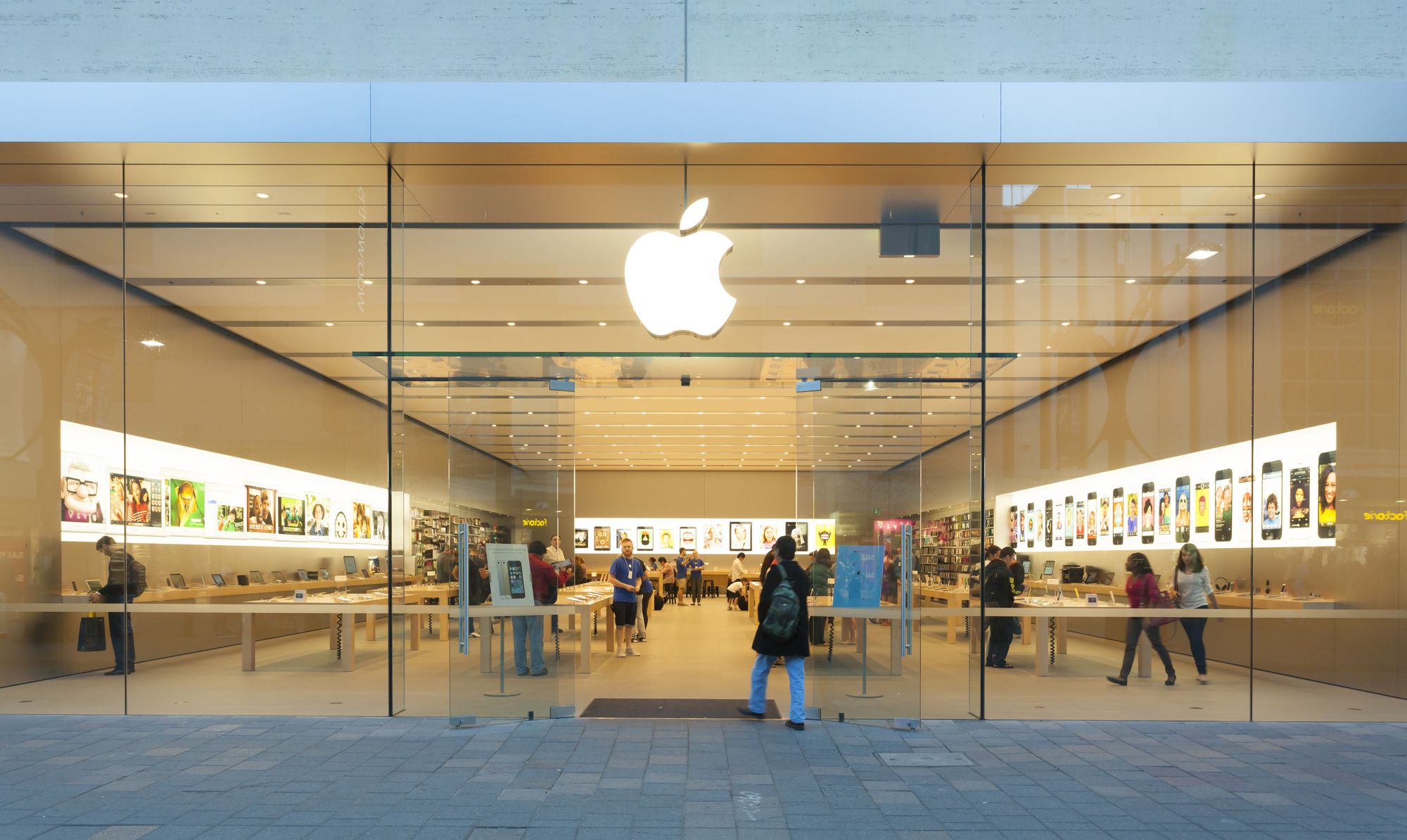 Adelaide, Australia - September 23, 2013: Apple Store in Adelaide, Australia, with pedestrians passing by outside the store. It is the first Apple Store in South Australia. It is located at Rundle Mall, Adelaide.