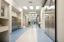 doctor walking in a hospital corridor