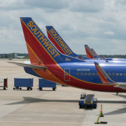ATLANTA, GEORGIA-AUGUST 20, 2015: Four Southwest Boeing 737-3H4 airplanes at the Atlanta International Airport. Southwest Airlines operates more than 3,400 flights per day.