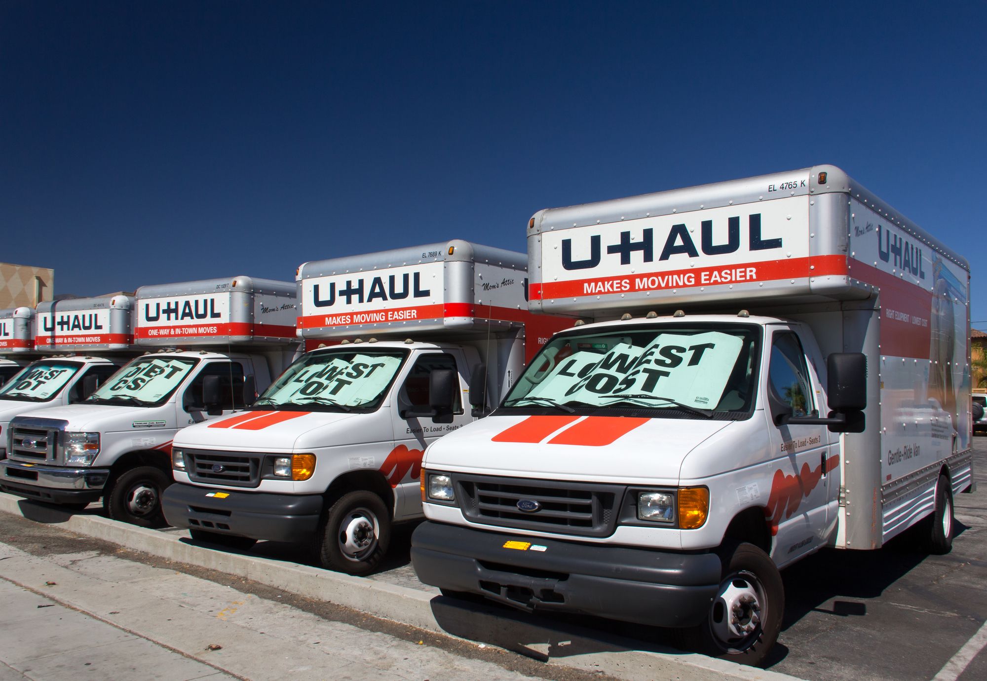 PASADENA, CA/USA - AUGUST 16, 2014. U-Haul trucks lined up in a row. U-Haul is a moving equipment and storage rental company based in Phoenix, Arizona.