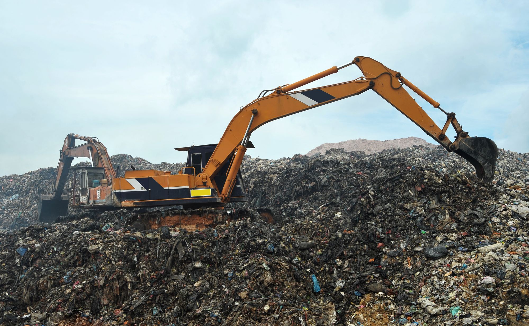 Excavator working in a landfill