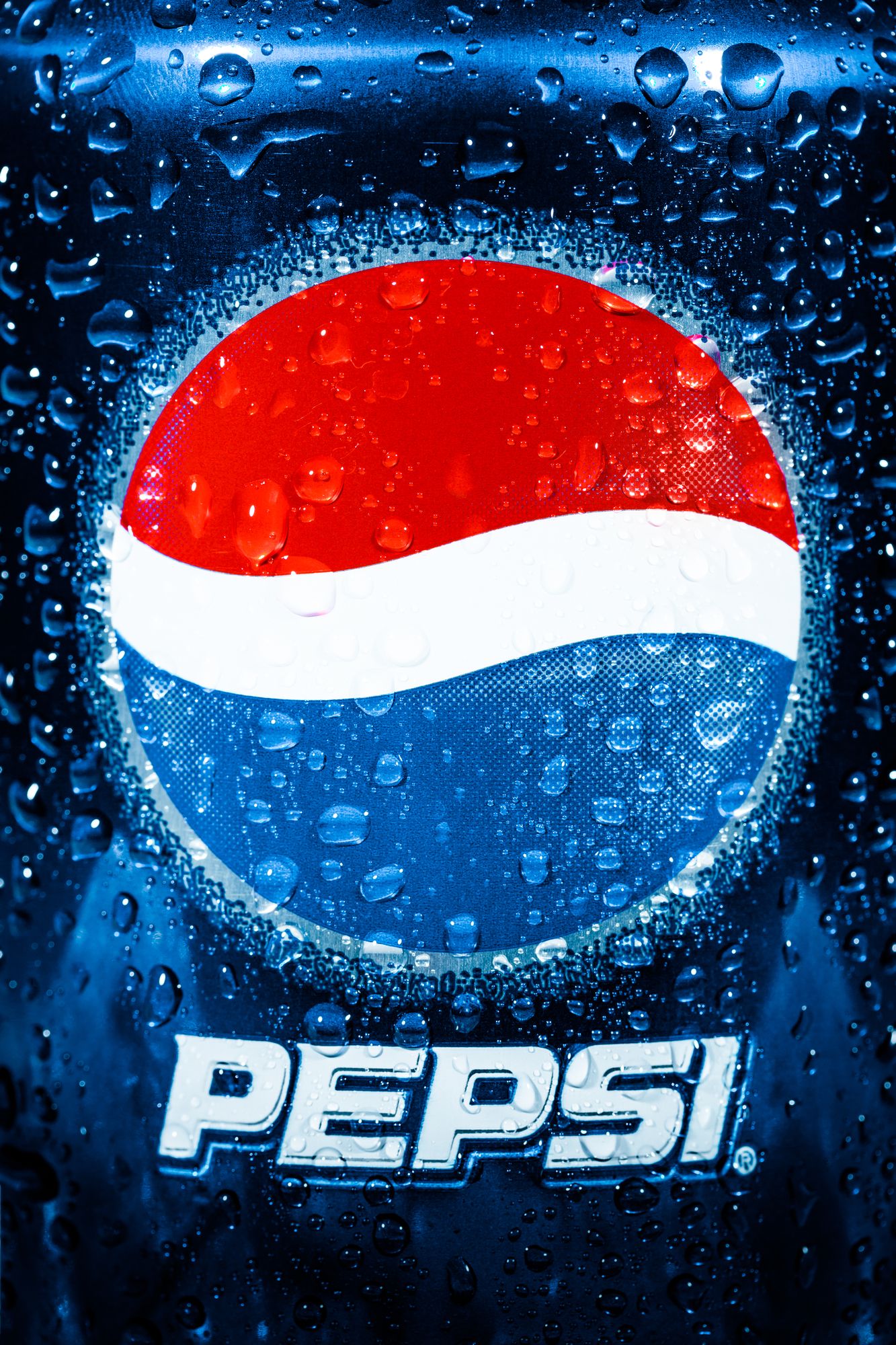 MOSCOW, RUSSIA-APRIL 4, 2014: Can of Pepsi cola closeup. Pepsi is a carbonated soft drink that is produced and manufactured by PepsiCo. Created and developed in 1893.