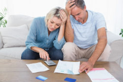 home loan modification mortgage couple worrying over bills