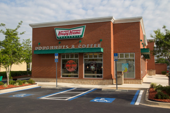 JACKSONVILLE, FL - APRIL 27, 2014: A Krispy Kreme Doughnuts store in Jacksonville. Krispy Kreme was founded on July 13, 1937 by founder Vernon Rudolph.