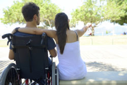 Unum long term disability woman and man in wheelchair