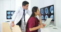doctors looking at brain scan of Mirena Pseudotumor lawsuit