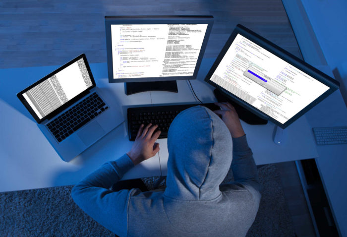 Illustration of hacker in Saks Fifth Avenue data breach