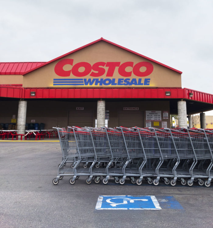 costco shopping carts in front of the wholesale store
