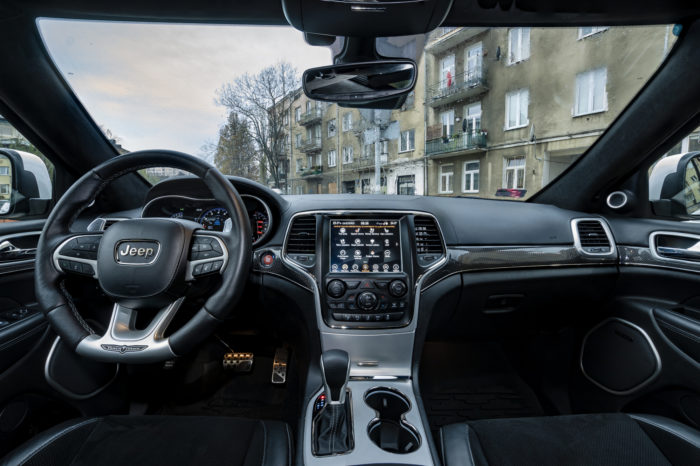 interior of a Jeep Grand Cherokee with steering wheel and gearshift