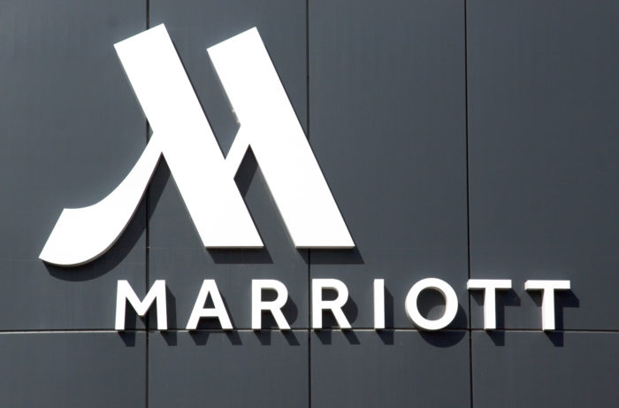Marriott sign on a hotel. A Marriott data breach affected millions of customers last year