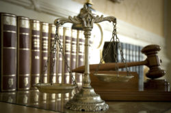 A set of scales, a gavel, and some law books