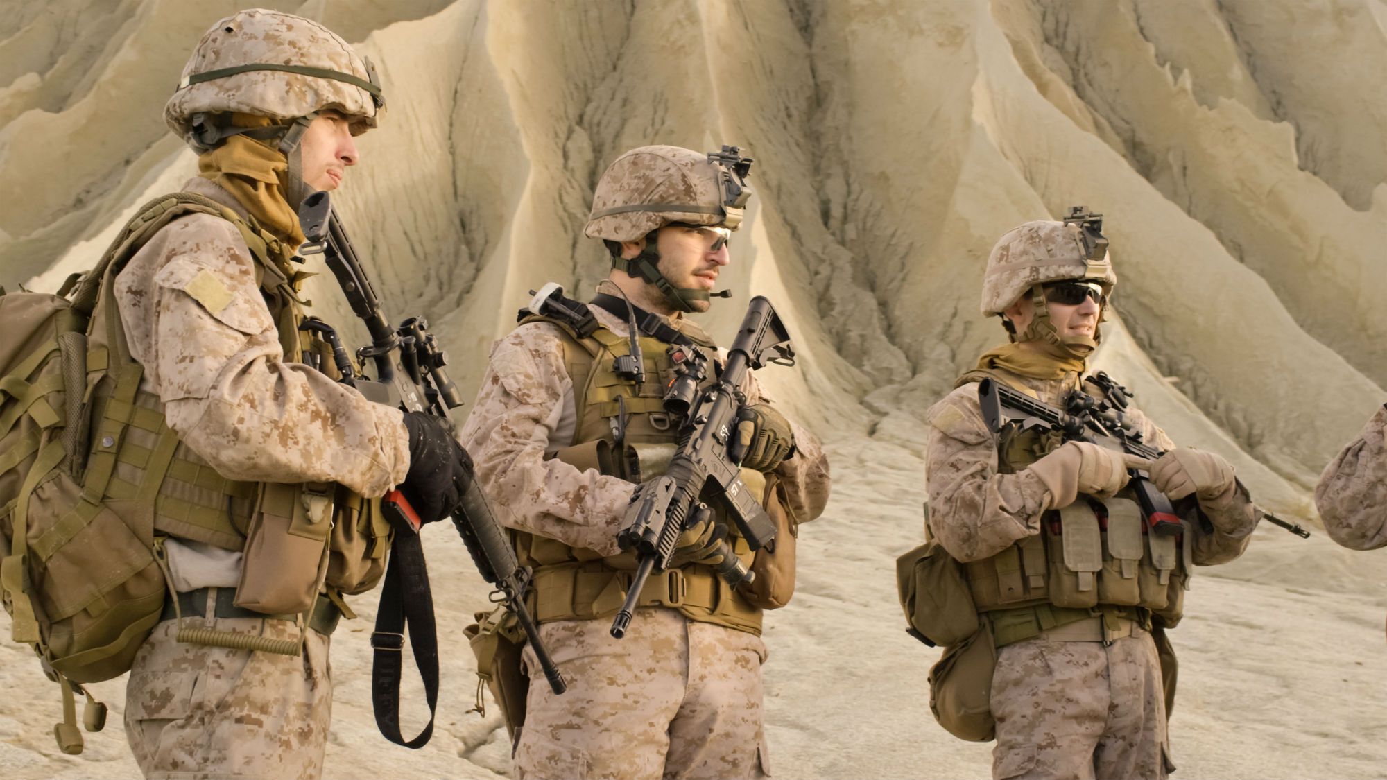 Three soldiers in the desert