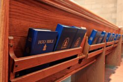 Church pews with bibles
