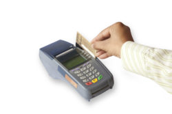 Hand swiping credit card
