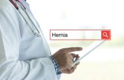 Man with lab coat with search term hernia