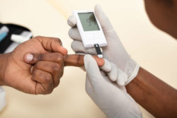 Close up of man taking diabetes test