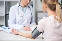 blood-pressure-check-by-nurse-woman-taking valsartan