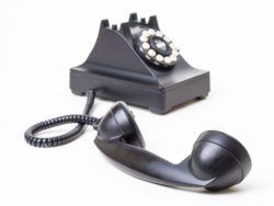 Black rotary telephone