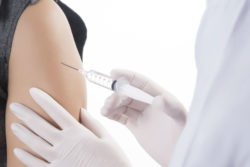 WOman receives shingles vaccination.
