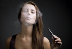 young woman smoking ecigarette