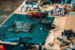 Circuit board and tools on table