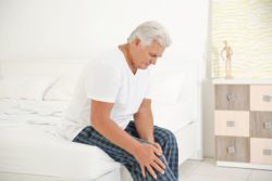 Elderly man with knee pain