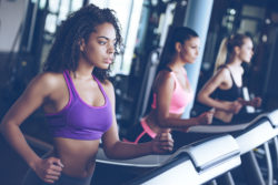 Women on treadmills in a health club