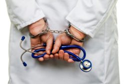 doctor in cuffs accused of sexual assault