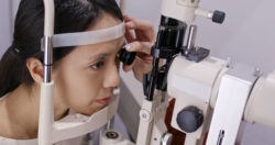 A woman gets her eyes examined.