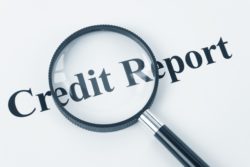 credit report magnifying glass