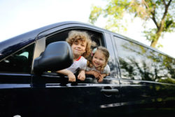 Kids in a Dodge Caravan