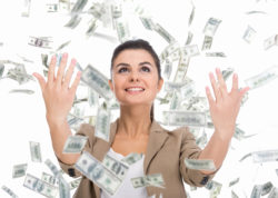 woman throwing cash in the air