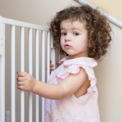 toddler touching security gate regarding Dreambaby Chelsea security gate recall