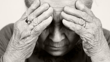 elderly woman looking upset regarding the expanding class action lawsuit against Canadian retirement facilities over senior abuse