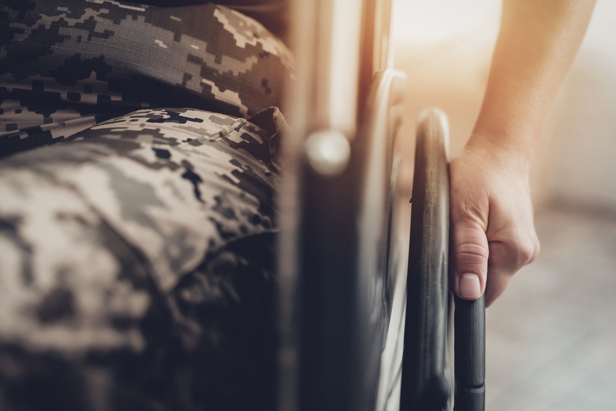 Lower half of a veteran in a wheelchair regarding the federal court ruling in favor of the injured veterans' disability benefits class action lawsuit