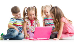 kids looking at laptop