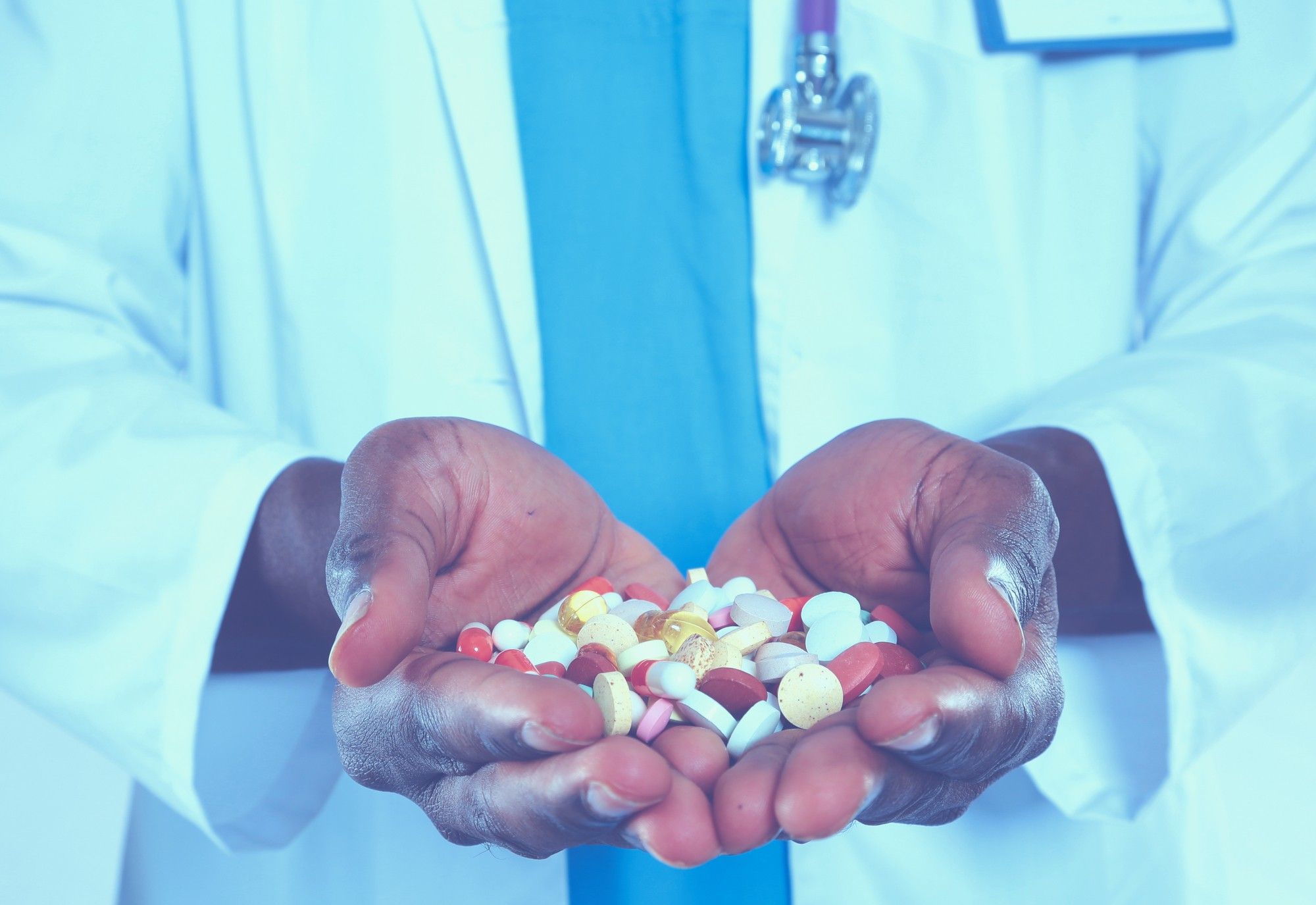 pharmacist hands holding pills