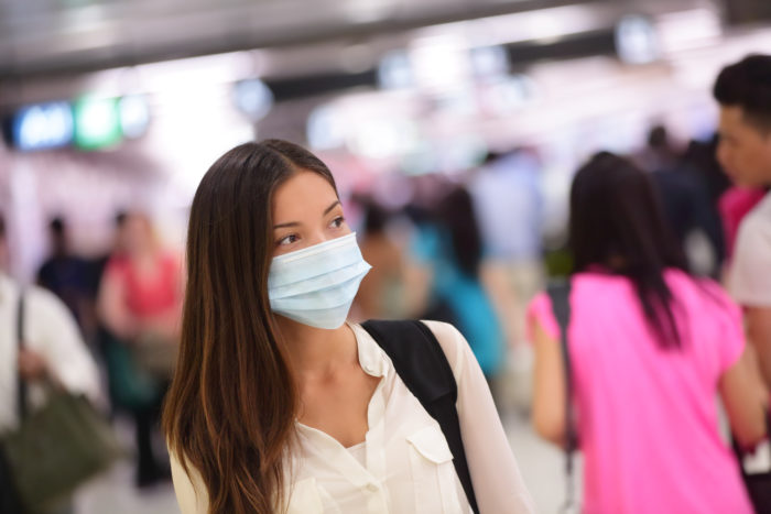 woman wearing mask to protect against coronavirus