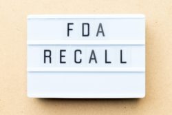 A sign says FDA Recall