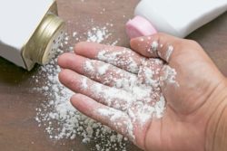 Does asbestos occur naturally in talc?