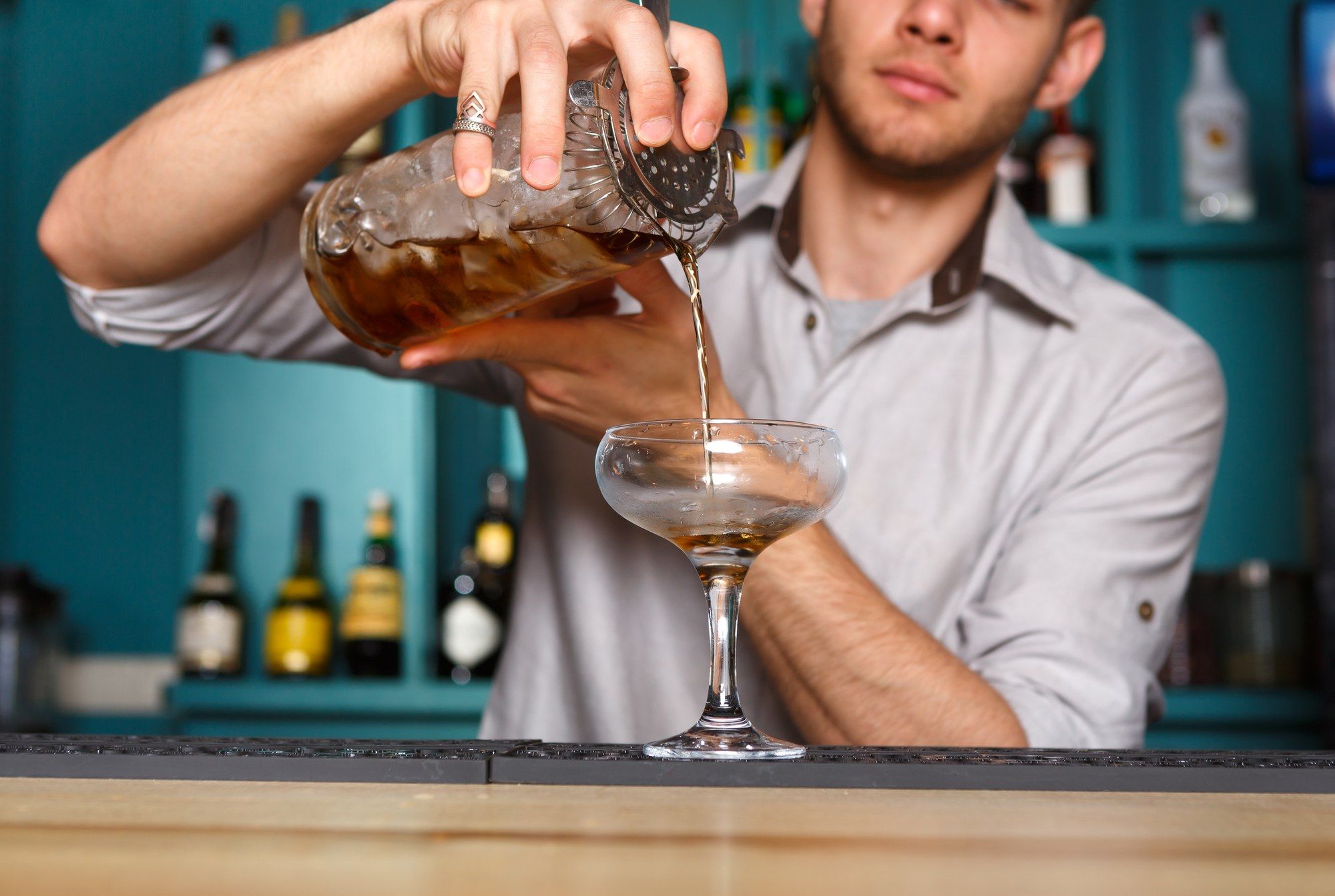 Bartender makes a drink